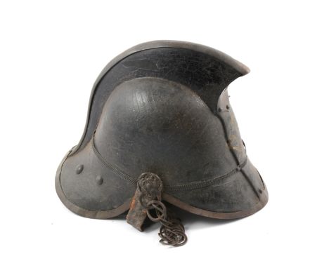 19th century leather fire helmet, high comb, brass trimming all round, brass scaled chinstrap.