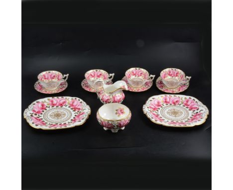 A pair of Davenport bone china dessert plates, magenta ground, gilt borders, painted with floral sprays, pierced rims, 24cm d