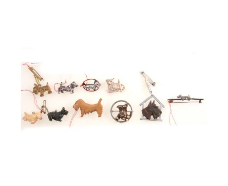 Novelty vintage Scottie Dog brooches, in white metal marked silver, other metals, celluloid, bakelite, paste, wood, 20mm to 4