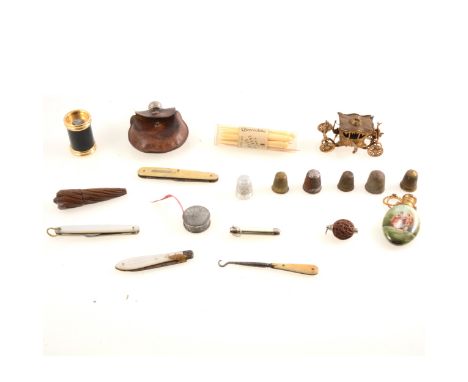 Vintage collectables, sewing tape measure in the State Carriage, porcelain perfume bottle, small nut pencil, silver fruit kni