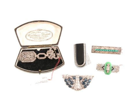 Five Art Deco brooches and dress clips, a rectangular brooch with faux jadeite frame and set with clear baguette and brillian