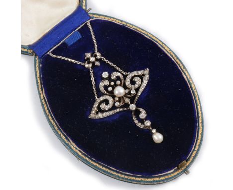 A diamond Belle Epoque brooch/pendant, a central 5.5mm pearl in a yellow and white metal scrolling frame of old and rose cut 