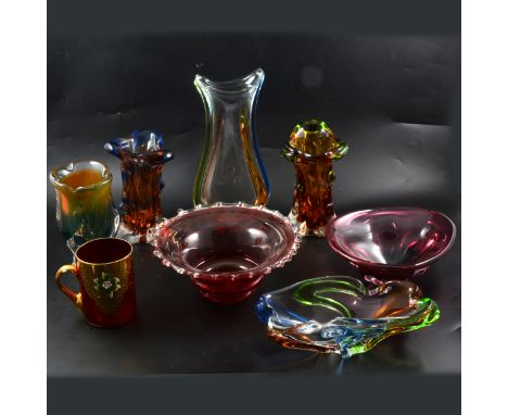 Seven Murano style glass vessels, including three multi-coloured vases with knobbly finish, a ruby glassed flared glass bowl,