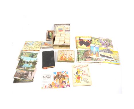 A postcard album covering Rugby, Coventry, Leicester and London; loose postcards; Player's and Brooke Bond cigarette and trad