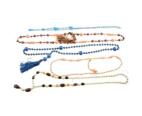 Five vintage sautoir necklaces, 1920's, faux lapis lazuli sautoir with 11mm and 22mm beads,120cm plus 15cm cord tassel,100cm 