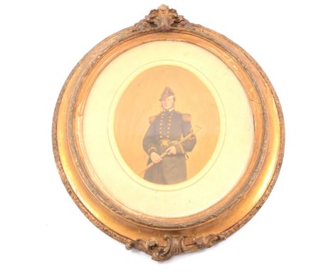 American Civil War interest - a threequarter length portrait of a naval officer, believed to be a surgeon, gilt oval frame, 4