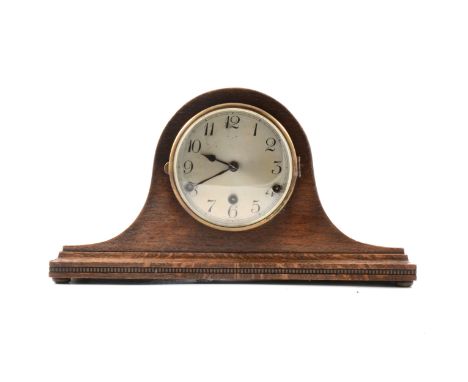 Oak mantel clock, domes case, silvered dial, the movement striking on five gongs, 25cm, with key and pendulum.