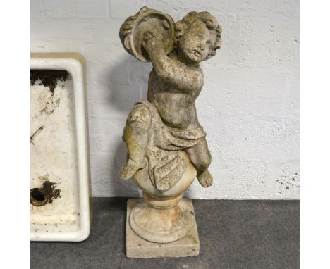 Cast concrete garden statue, putti playing a tambourine, height 100cm.