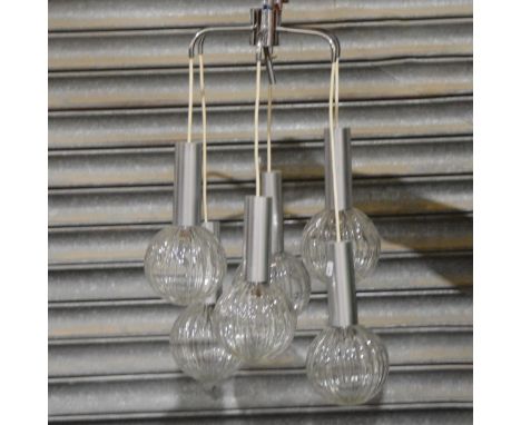 Mid-century vintage light fitting, six moulded glass globe shades, with chromed housings, suspended on chords.