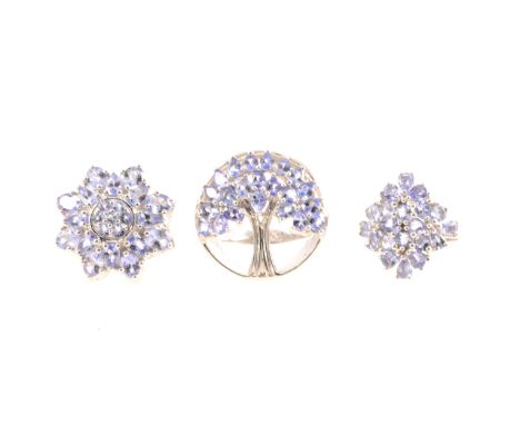 Gemporia - Three large tanzanite dress rings, a 20mm circular cluster, 6 carats, a 24mm Tree of Life set with twenty-two pear