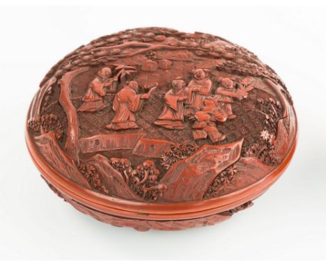 A Chinese cinnabar lacquer covered dish, early 20th century, of bun form with both domed lid and body having relief carved sc
