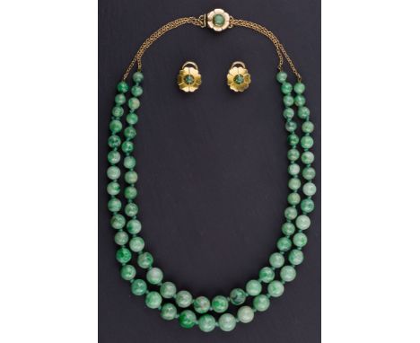 A vintage Chinese jade and 14ct gold necklace, mid-20th century, the double string of graduated, mottled green jade beads str