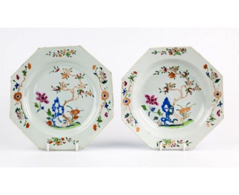 An 18th century Chinese famille rose soup bowl, octagonal form with everted rim, with gnarled trunk bearing blooms, peony and