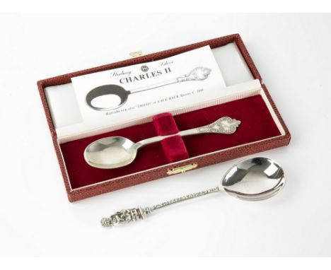 Two reproductions of 17th century silver spoons, comprising a Charles II style lace back trefid spoon, Francis Howard Ltd., S