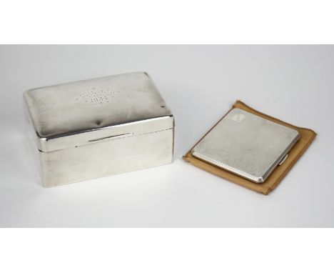 A George V silver cigarette box, Walker &amp; Hall, Sheffield 1923, plain form with cedar wood lining, inscribed 'D.C.G.U 192