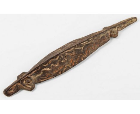 Native tribal interest - an Australian Aboriginal wooden totemic carving, of flared and planate form, naively modelled in the