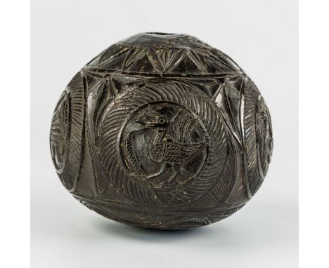 An antique carved coconut bugbear flask, probably mid-19th century, carved with various birds within roundels, one being atta