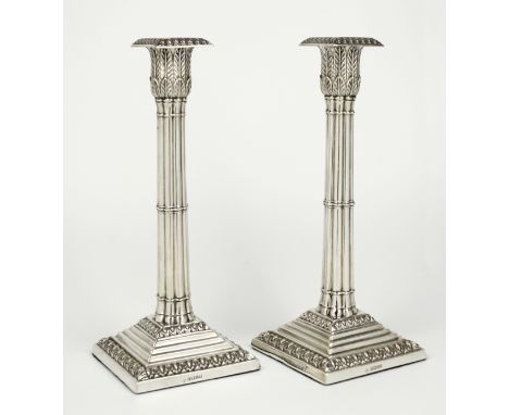A good pair of Victorian silver cluster column candlesticks, Martin, Hall &amp; Co., Sheffield 1883, the square egg and dart 