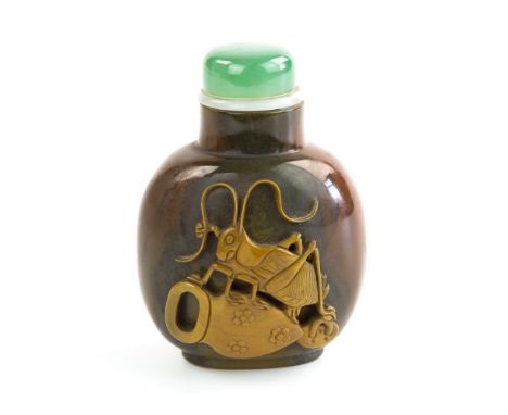 A Chinese cameo carved agate snuff bottle, 19th century, broad ovoid form with cameo carved cricket on amphora to front using