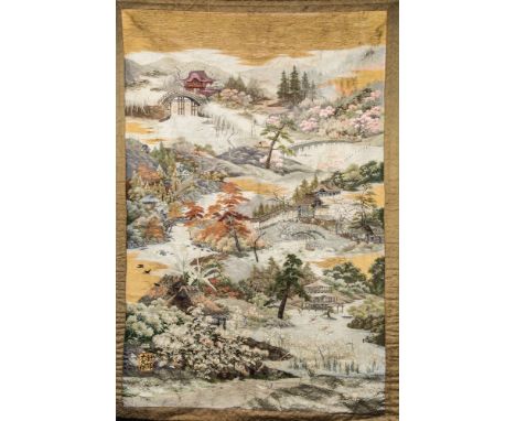 An exceptional Japanese silk embroidered wall hanging, Meiji period (1868-1912), utilising silks of vibrant autumnal shades, 