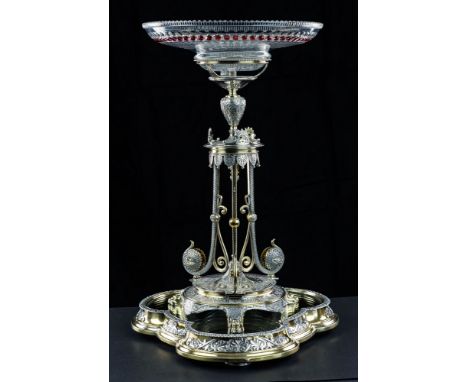 A fine Victorian silver and parcel gilt table centre piece by Elkington &amp; Co., Birmingham 1863, the 11in. clear and ruby 