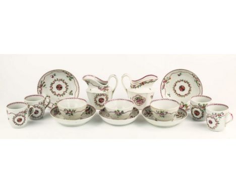 A New Hall hard paste famille rose part tea set, 1790-1805, pattern 338 with wheel within a wreath, comprising cream jug (pai