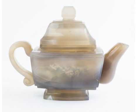 An 18th century Chinese smoked agate teapot, Qianlong period (1736-95), the tapered rectangular body with slightly convex sid
