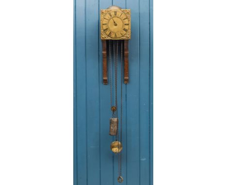 An 18th century weight driven 30 hour clock movement, by George Washborn of Gloucester, the 8¾in. square brass Roman dial wit