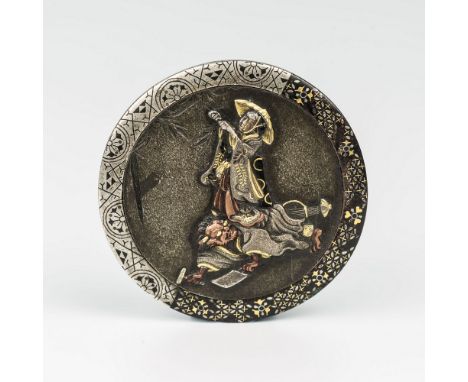 An inlaid plate from a Japanese kagamibuta netsuke, a well executed, mixed metal plate from a kagamibuta netsuke depicting a 