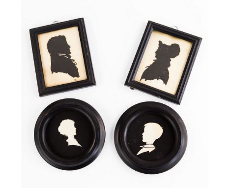 Four Edwardian silhouettes, two white paper on black card, one depicting a youthful male bust portrait, the second a youthful