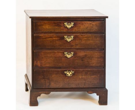 A small George III mahogany four drawer bachelor's chest, possibly American, the reed moulded top over four long graduated dr