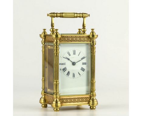 An unusual French gilt brass pillar case carriage clock, early 20th century, by Duverdrey &amp; Bloquel, the white enamel Rom