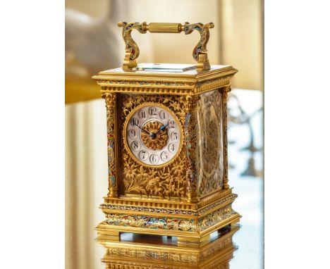 A fine late 19th century champlevé enamel carriage clock by Maurice and Co., the anglaise riche case with Corinthian capitals