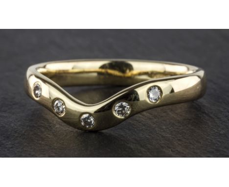 An 18ct yellow gold and diamond wishbone wedding ring, inset with five brilliant cut diamonds, ring size M.