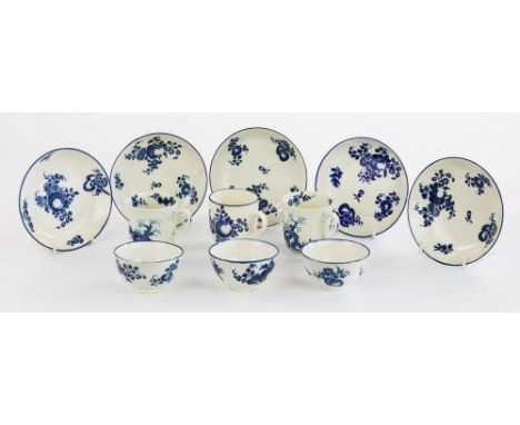 Early first period Worcester tea bowls, coffee cans and saucers, circa 1780, comprising three tea bowls and four 5in. saucers