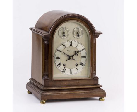 A Winterhalder and Hofmeier quarter striking mantel clock, c.1900, the arched silvered dial with Roman chapter ring and subsi