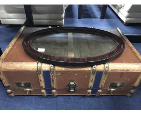 EDWARDIAN MAHOGANY OVAL WALL MIRROR along with a c. 1930s travel trunk 