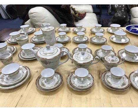 NORITAKE RED AND GILT TEA AND COFFEE SERVICEcomprising of 12 teacups and saucers, 12 coffee cups and 11 saucers, 10 small sid