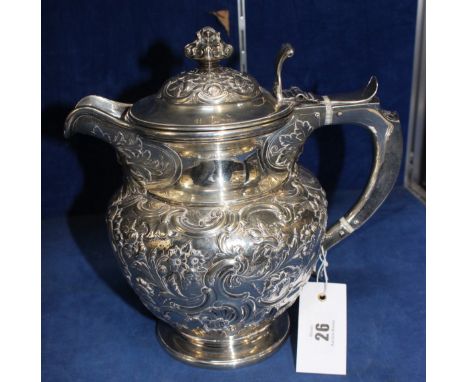 A William IV Scottish silver coffee or hot water jug by James McKay Edinburgh 1832, with a chased finial to the domed cover, 