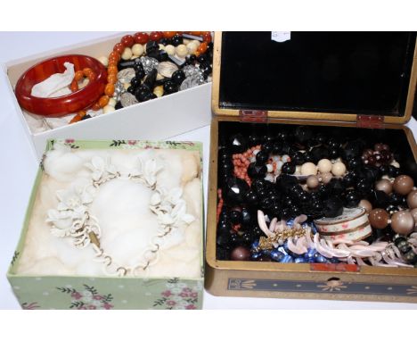 A quantity of vintage beaded necklaces, a shell bracelet, Bakelite bangle etc 