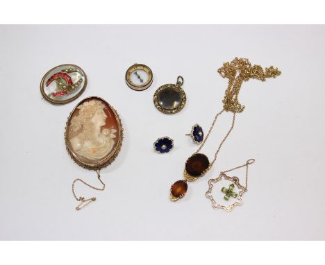 A 9ct gold cameo brooch, a 9ct gold chain necklace with citrine drop pedant, a pair of 15ct gold and blue enamel earrings (af