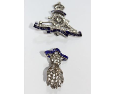 A paste and enamel sweetheart brooch, the cannon with a crown surmount and banners bearing the regimental Latin motto, 4cm lo