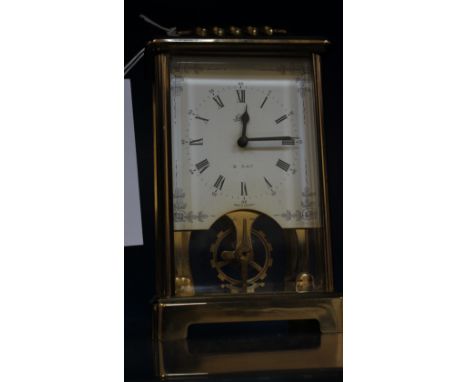 A carriage clock miniature and case together with an eight day carriage clock