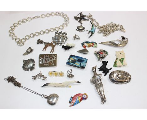 A quantity of silver and other costume jewellery to include mid-20th Century brooches, earrings, pendants on chains, enamel b