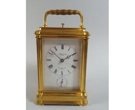 A French Gilt Brass Carriage Clock. The White Enamel Dial Inscribed Leroy and Fils, Regent St, London. Palais Royal 13.15 Par