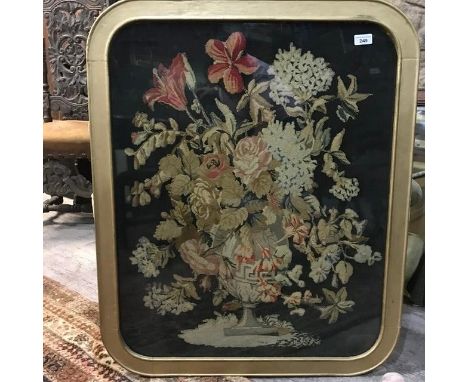 A Victorian Berlin work style needlework panel, decorated a vase of flowers, 77.5 x 62.5 cm, framed 