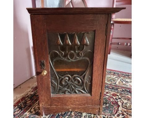 An Art Nouveau small oak cupboard, 34 cm wide, adapted, an oval wall mirror, three model aeroplanes, two radios, scientific i