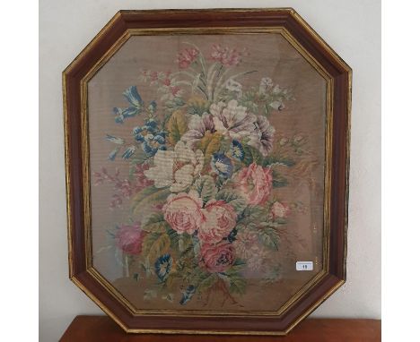 A Victorian floral needlework panel, 64 x 54 cm, in a later octagonal frame 