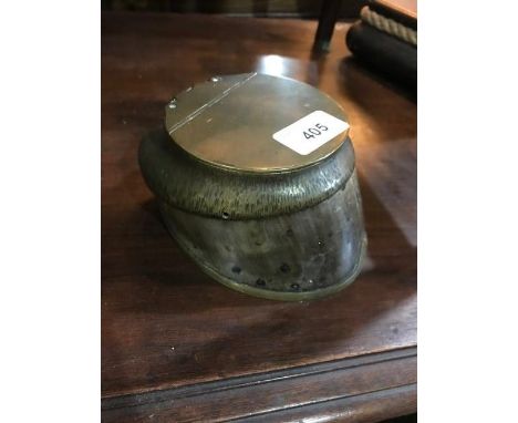 A Victorian inkwell, made from a horse hoof 