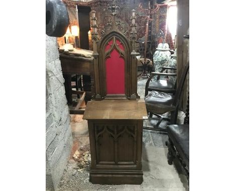 A Victorian Gothic cabinet, with a panel door, 50 cm wide x 150 cm high 